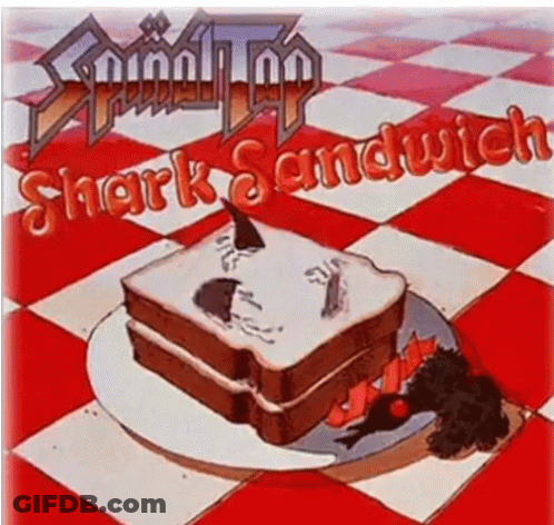 A Picture Of A Shark Sandwich On A Plate GIF