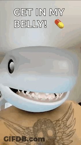 A Picture Of A Shark With The Words Get In My Belly Above It GIF