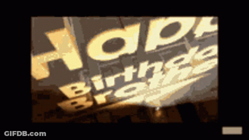 A Picture Of A Sign That Says Happy Birthday On It GIF