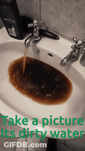 A Picture Of A Sink With Dirty Water Coming Out Of The Faucet GIF