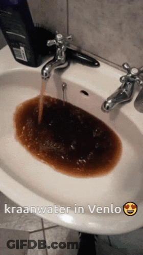 A Picture Of A Sink With Kraanwater In Venlo Written Below It GIF