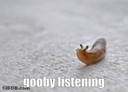 A Picture Of A Snail With The Words Goobby Listening Written Below It GIF