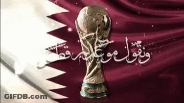 A Picture Of A Soccer Trophy With Arabic Writing Behind It GIF