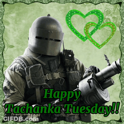 A Picture Of A Soldier Holding A Gun With The Words Happy Tachanga Tuesday GIF