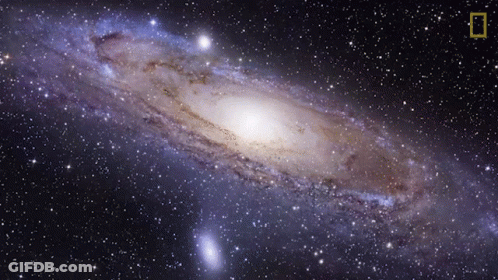 A Picture Of A Spiral Galaxy With The National Geographic Logo In The Corner GIF