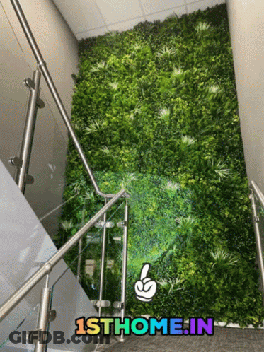 A Picture Of A Staircase With A Green Wall And The Website 1Sthome.in GIF