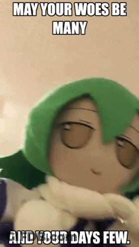 A Picture Of A Stuffed Animal With Green Hair And The Words " May Your Woes Be Many And Your Days Few " GIF