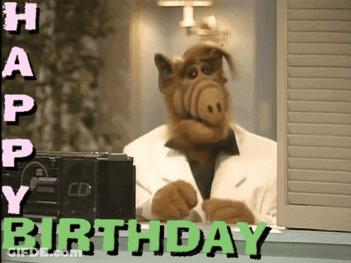 A Picture Of A Stuffed Animal With The Words Happy Birthday Written On It GIF