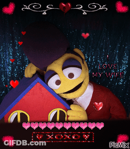 A Picture Of A Stuffed Animal With The Words Love My Wife GIF