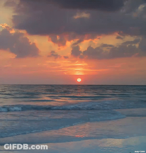 A Picture Of A Sunset On The Beach Was Taken By Andy C 2008 GIF