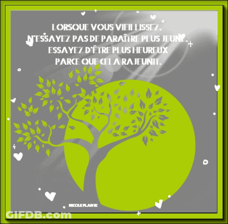 A Picture Of A Tree In A Green Circle With Hearts Around It GIF