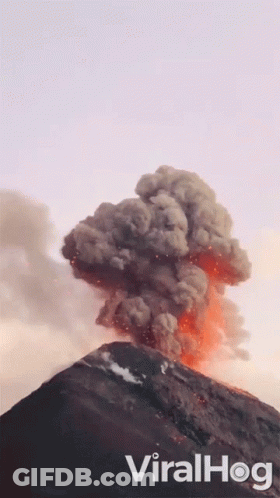 A Picture Of A Volcano Erupting With The Words Viralhog Written Below It GIF