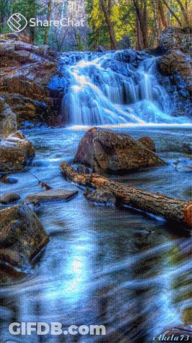 A Picture Of A Waterfall With The Name Akela 73 On The Bottom GIF