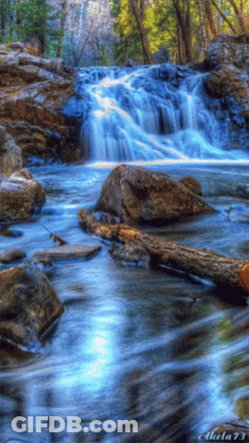 A Picture Of A Waterfall With The Number 73 On The Bottom GIF