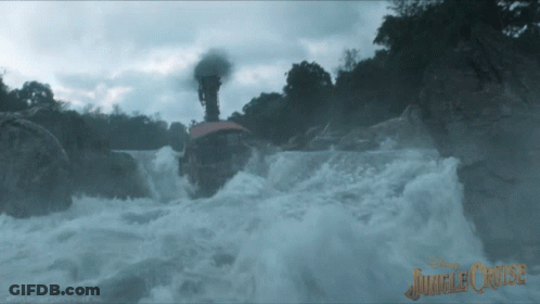 A Picture Of A Waterfall With The Words Jungle Cruise On The Bottom GIF