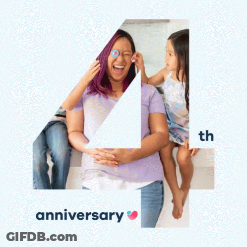 A Picture Of A Woman And A Child With The Number 4 In The Background GIF