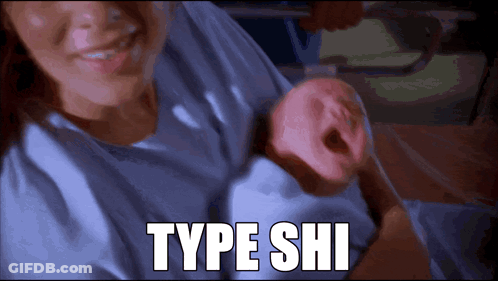 A Picture Of A Woman Holding A Baby With Type Shi Written In White GIF