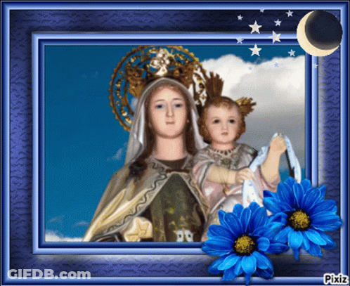 A Picture Of A Woman Holding A Child With Blue Flowers In The Foreground GIF