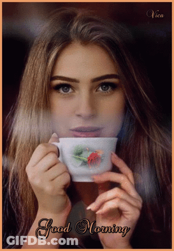 A Picture Of A Woman Holding A Cup Of Coffee With The Words " Good Morning " On The Bottom GIF