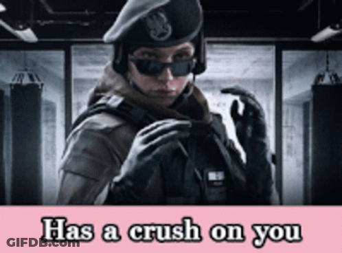 A Picture Of A Woman In A Military Uniform With The Words Has A Crush On You GIF