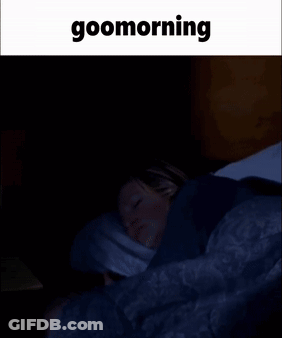 Woman Lying In Bed With Goomorning Text GIF