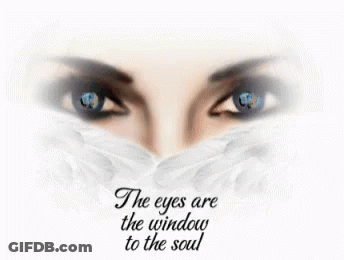 A Picture Of A Woman 'S Face With The Words " The Eyes Are The Window To The Soul " GIF