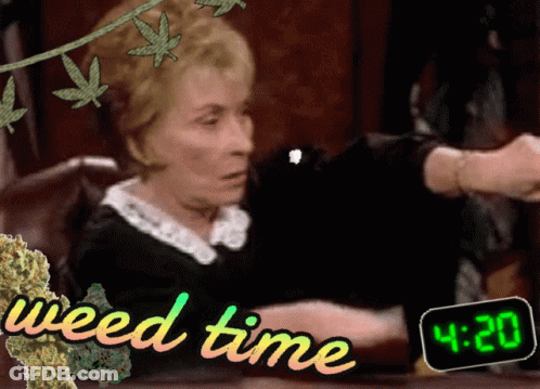 A Picture Of A Woman Sitting At A Table With 4:20 On The Clock GIF