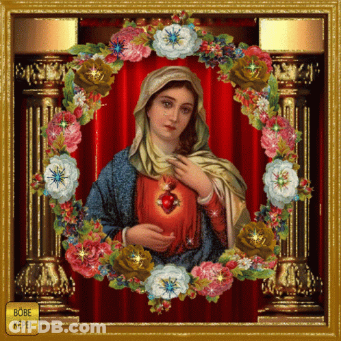 A Picture Of A Woman Surrounded By Flowers With The Words Bobe Kopel On The Bottom Right GIF