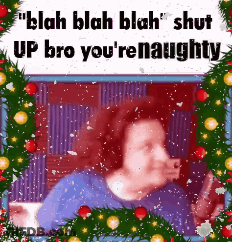 A Picture Of A Woman Taking A Selfie With Christmas Decorations Around Her GIF