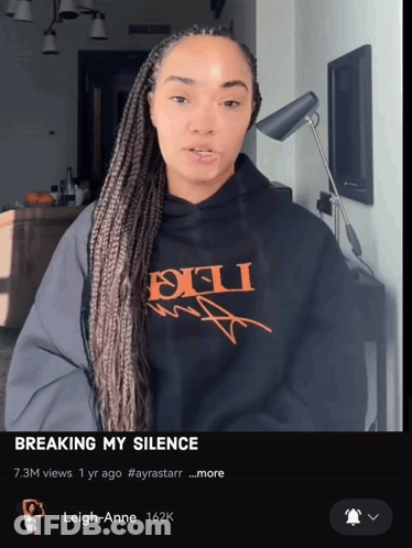 A Picture Of A Woman Wearing A Black Shirt That Says Breaking My Silence GIF