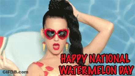 A Picture Of A Woman Wearing Sunglasses And A Watermelon With The Words Happy National Watermelon Day GIF