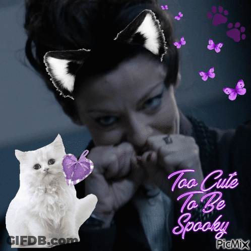 A Picture Of A Woman With A Cat Ear And The Words Too Cute To Be Spooky GIF