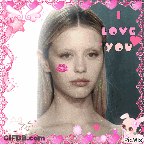 A Picture Of A Woman With A Kiss On Her Cheek And The Words " I Love You " GIF