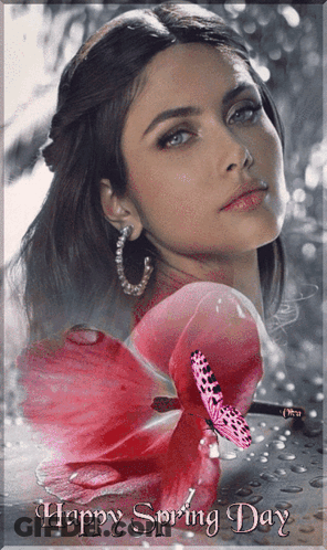 A Picture Of A Woman With A Pink Flower And The Words Happy Spring Day On The Bottom GIF