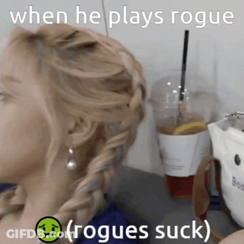 A Picture Of A Woman With A Sad Face Next To The Words Rogues Suck GIF