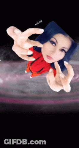 A Picture Of A Woman With Blue Hair And The Name Mr2rez On The Bottom Right GIF