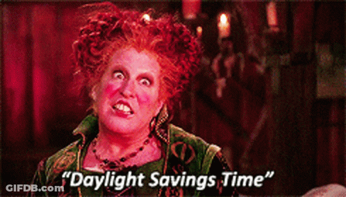A Picture Of A Woman With Red Hair And The Words Daylight Savings Time GIF