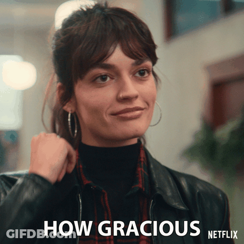 A Picture Of A Woman With The Words How Gracious Written On It GIF