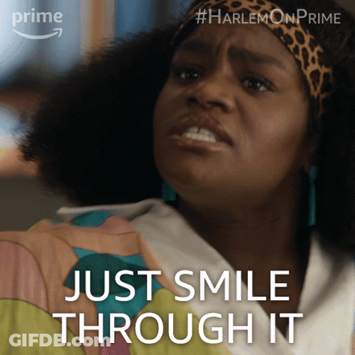 A Picture Of A Woman With The Words Just Smile Through It On The Bottom GIF
