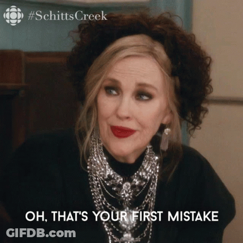 A Picture Of A Woman With The Words Oh That 'S Your First Mistake Below Her GIF