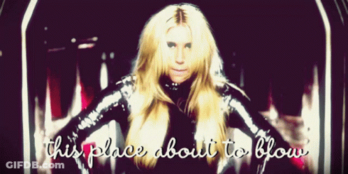 A Picture Of A Woman With The Words " This Place About To Blow " On The Bottom GIF