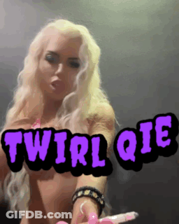 A Picture Of A Woman With The Words Twirl Qie GIF