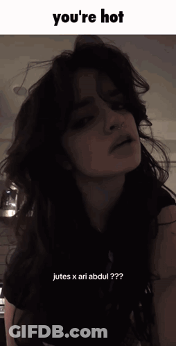 A Picture Of A Woman With The Words You 'Re Hot Jutes X Ari Abdul GIF