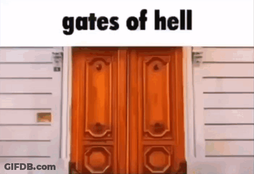 A Picture Of A Wooden Door With The Words Gates Of Hell Below It GIF