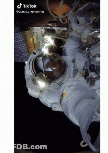 A Picture Of An Astronaut Floating In Space With Tiktok Written On The Bottom Right GIF