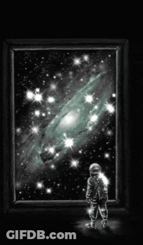 A Picture Of An Astronaut Looking At A Galaxy GIF