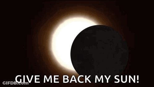 A Picture Of An Eclipse With The Words `` Give Me Back My Sun '' Written Below It . GIF