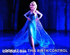 A Picture Of Elsa From Frozen Dancing On A Stage GIF