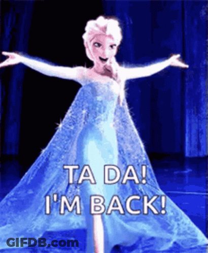 A Picture Of Elsa From Frozen With Her Arms Outstretched And The Words `` Ta Da ! I 'M Back '' . GIF