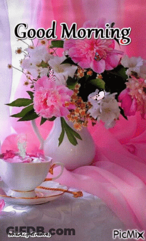 A Picture Of Flowers And A Cup Of Coffee With The Words Good Morning On It GIF